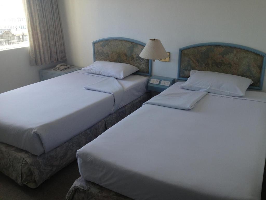 Hotel Sinthavee Phuket Pokoj fotografie