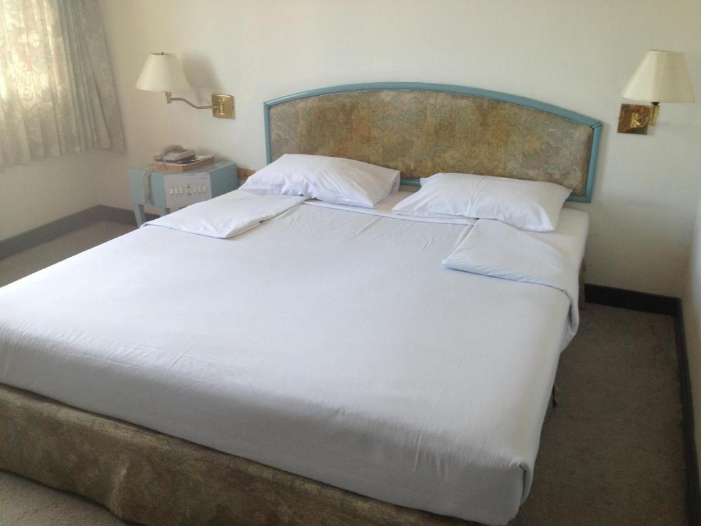 Hotel Sinthavee Phuket Pokoj fotografie